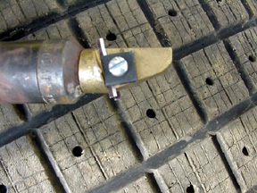 Siping blade/head mounted on heated iron.